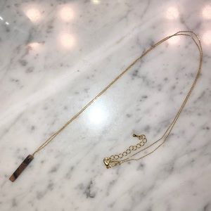 Gold layering necklace with wood drop